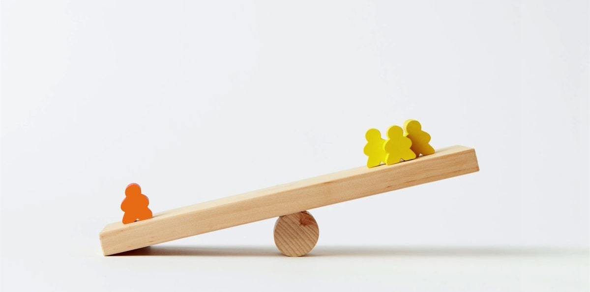 balancing figures on a see-saw is like trying to find the best employees for your business.